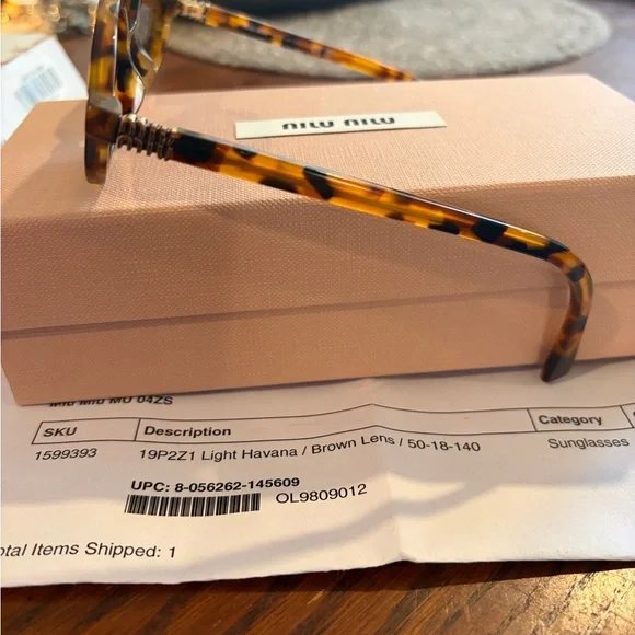 Miu Miu Tortoiseshell Oval Sunglasses with Brown Lenses - Picture 2 of 6